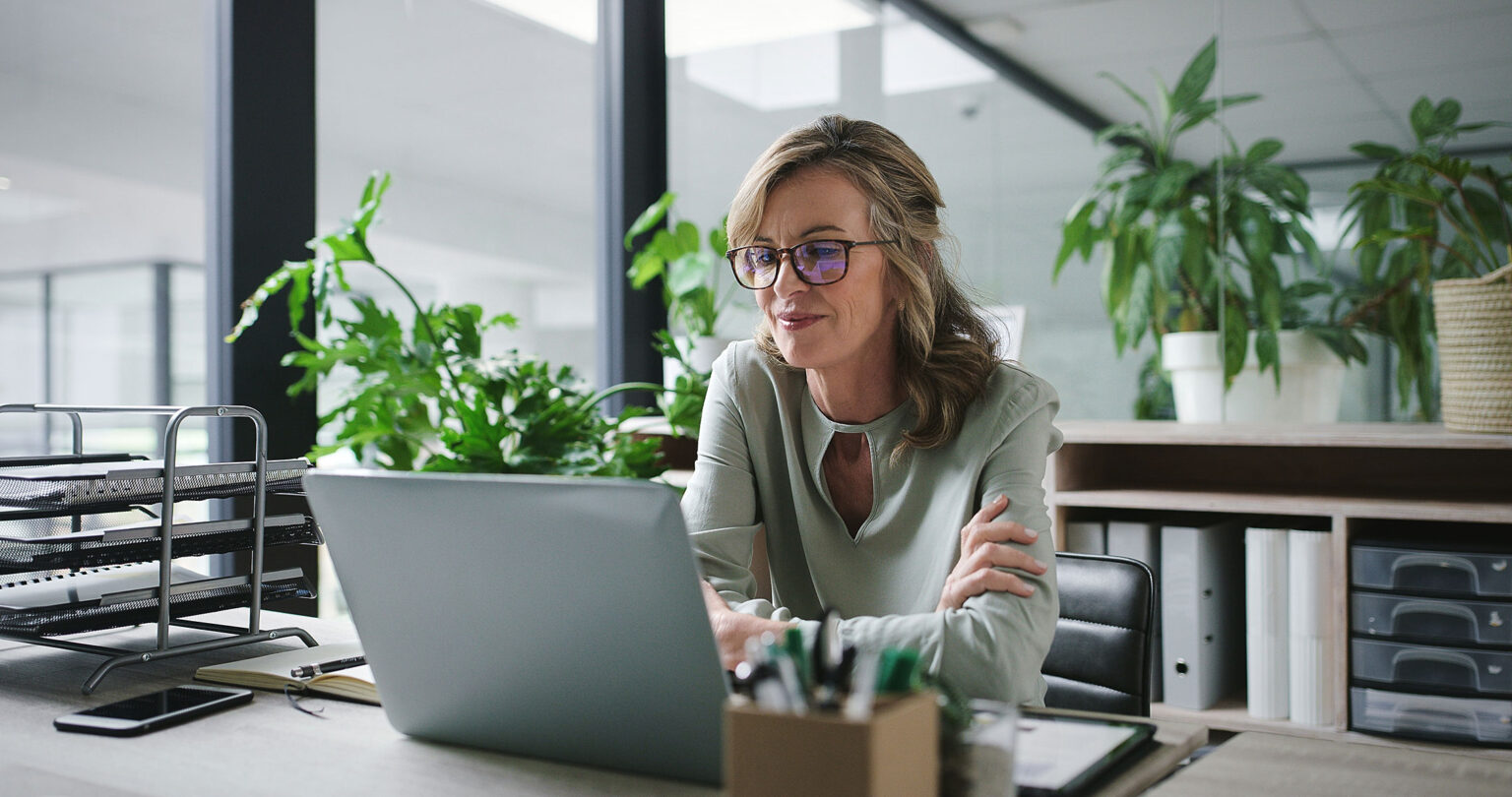 woman working on laptop on business internet